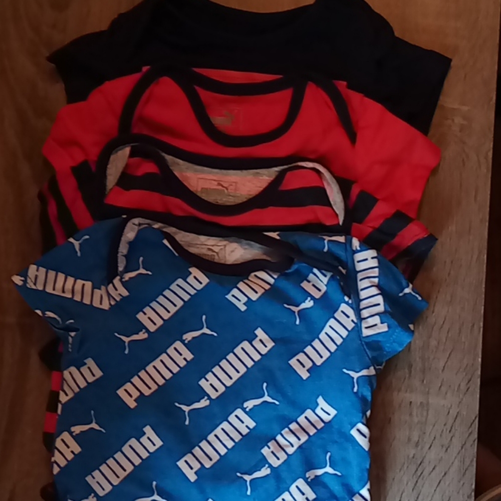 Puma 4 Pack onsies 12M (fit like 9-12m)